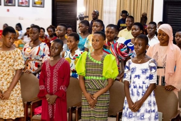 Confident B-GILD girls stand proudly during the closing ceremony, celebrating leadership, resilience, and educational achievements.