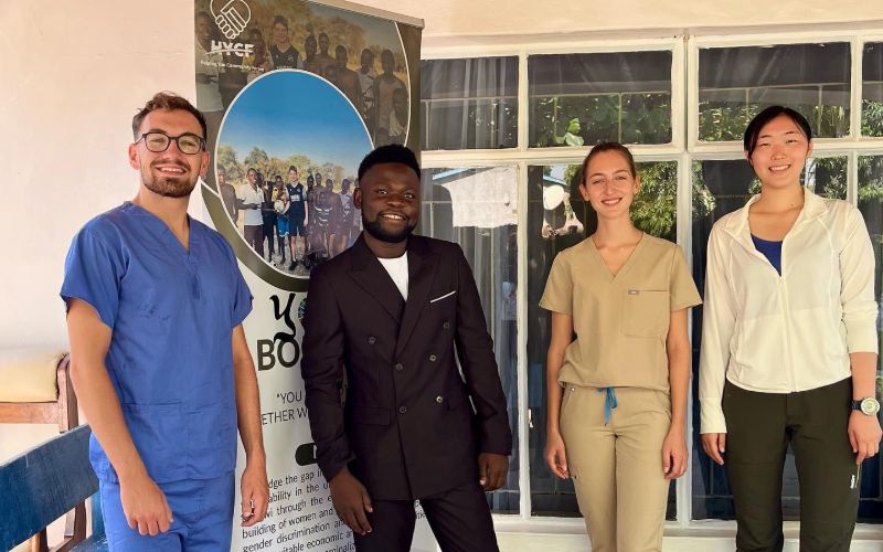 Medical interns in Malawi posing for a picture along with David the CEO.