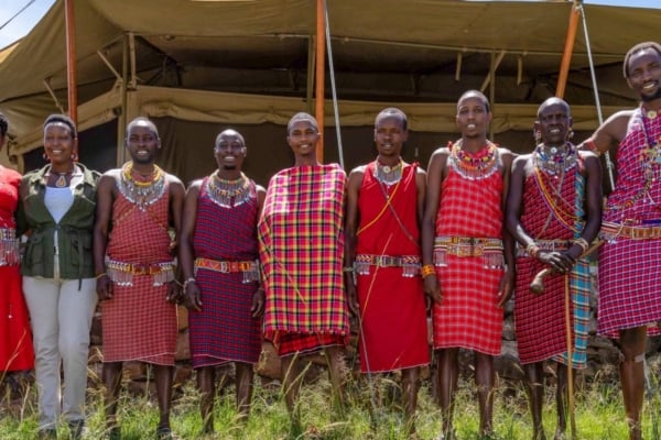 A group of locals in Kenya posing for a picture.