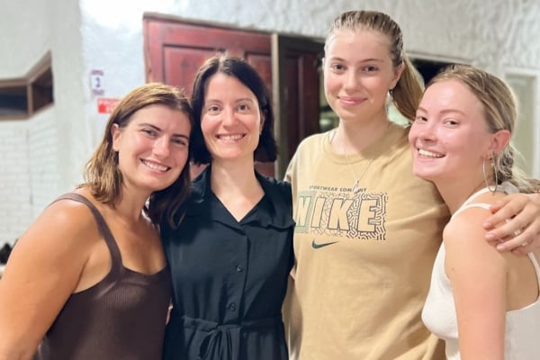 A group of four interns in Latin America posing for a picture.