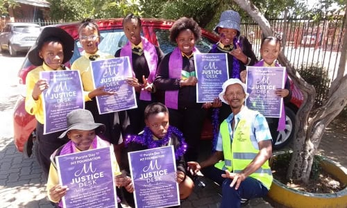 Group of kids with posters